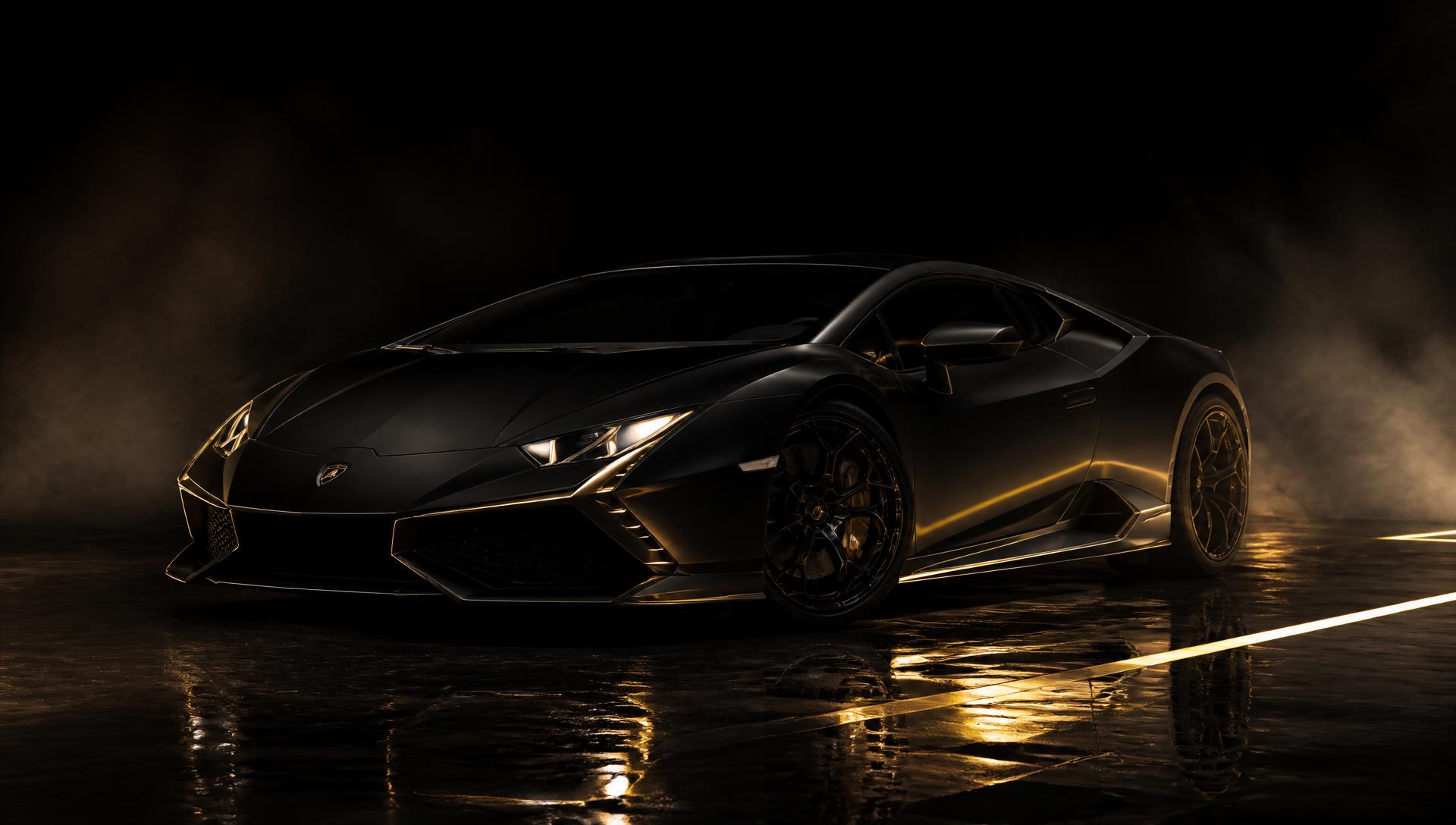 Matte black luxury supercar detailed to a mirror finish under dramatic studio lighting in Saskatoon